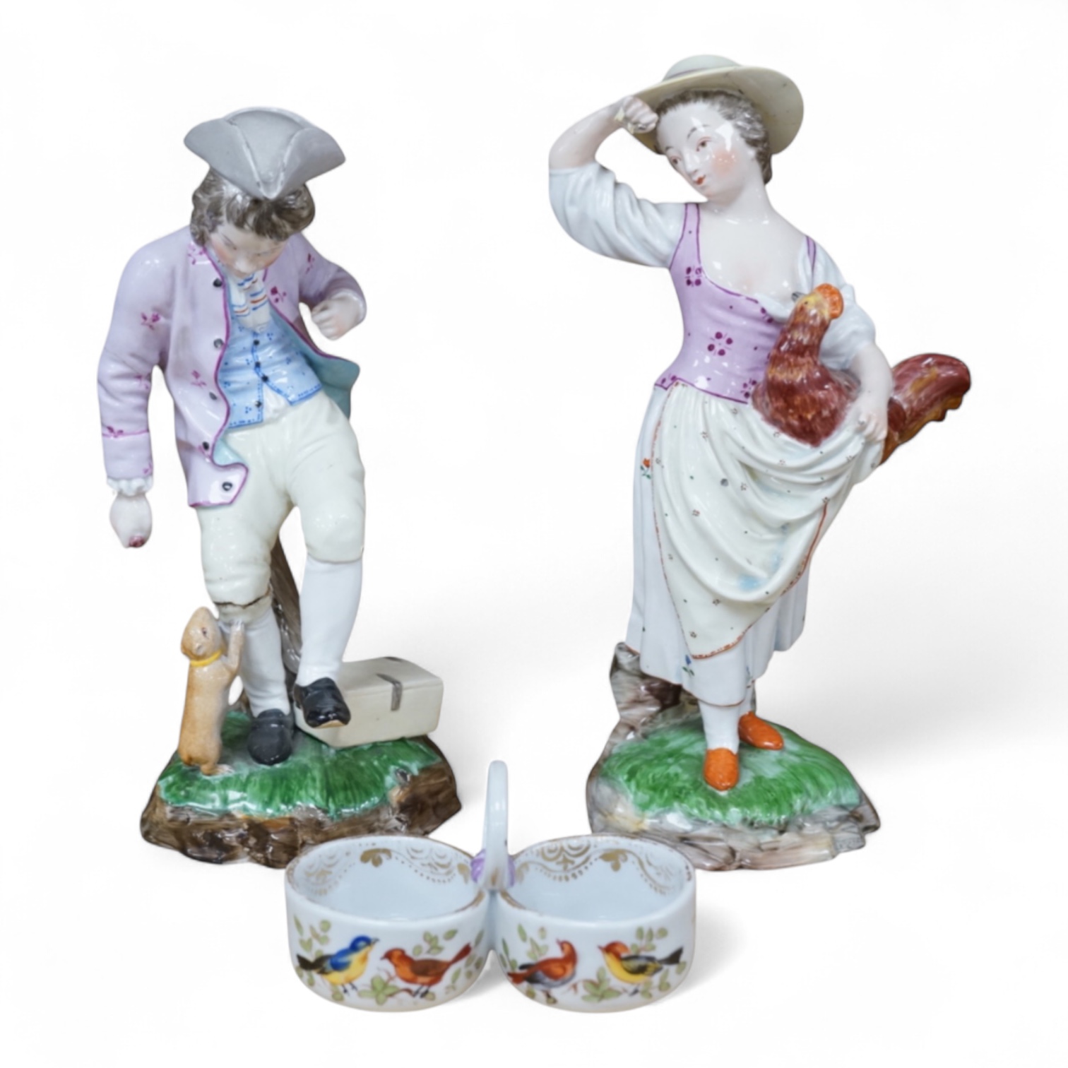 A pair of 19th century Hochst Damm faience figures and a Meissen twin section salt, tallest figure 20cm